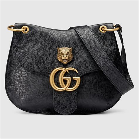 collana gucci medagliette|Gucci leather shoulder bag.